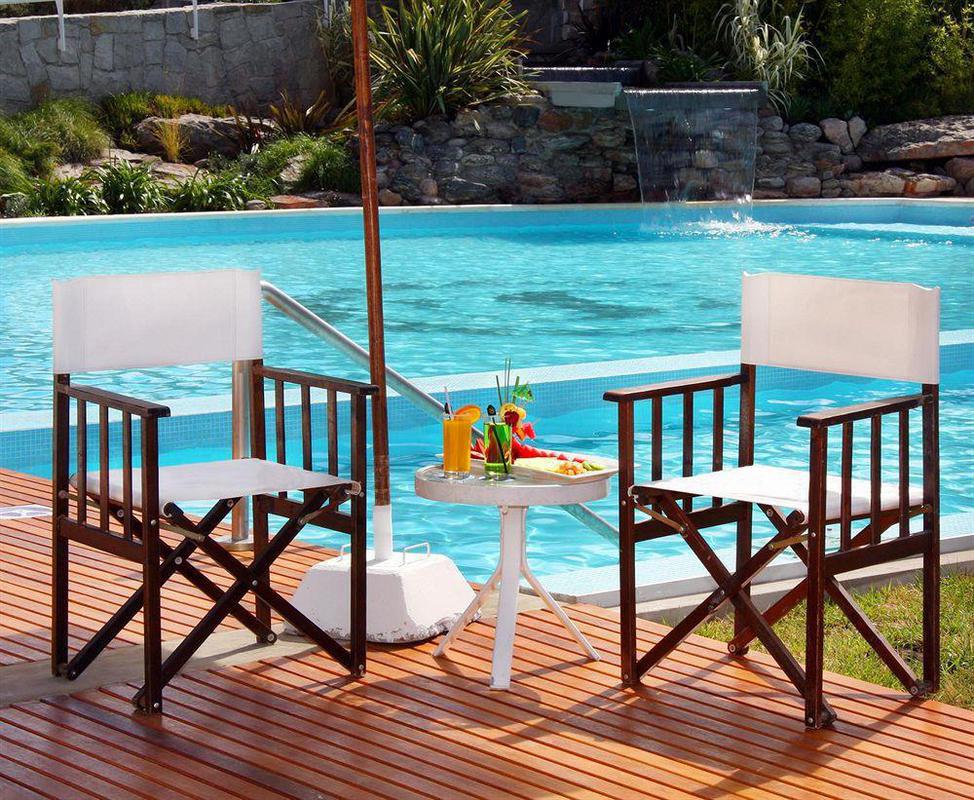 Sheraton Mar Del Plata Hotel Exterior photo Director's chairs at a pool